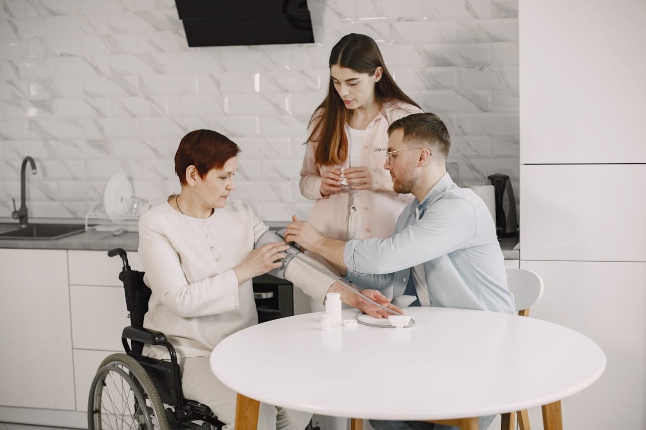 A family monitors blood pressure at home, ensuring health and wellness.